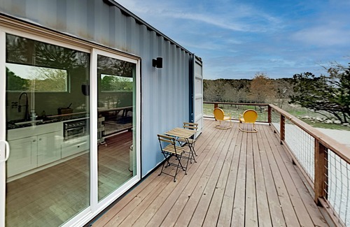 Spicewood House | Modern Container Home with Wraparound Deck & Covered BBQ Area