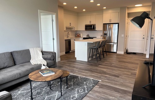 Springbank Hill Condo | Modern cozy brand new condo close to all amenities and the mountains.