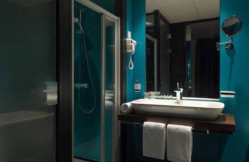 Municipality of Kerkrade Hotel | Modern Hotel Stay Near GaiaZOO – 12 Min Drive + Stadium Pitch View