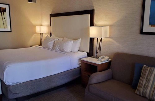 Downtown Resort | Modern King Unit with Sunset Views! Pool, Parking, Dining, and Gym Access!