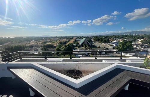 Eden Gardens Apartment | Modern Kingston Apartment Suite With Pool & Ocean View