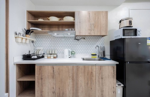 Lapu-Lapu Condo | Modern Nordic Studio with Balcony and Pool in Primeworld District Near Airport