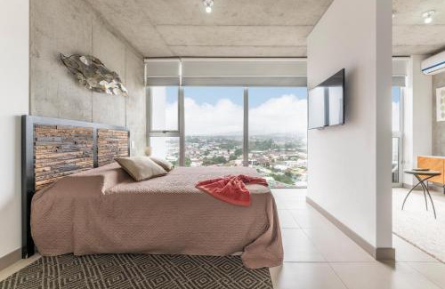 Curridabat Apartment | Modern Oasis iFreses, 18th floor! AC, TV and Pool