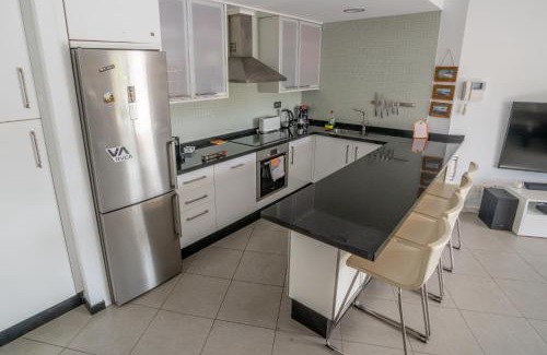 El Medano Apartment | Modern sea view duplex with parking and aircon