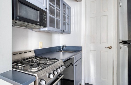 West Village Apartment | Modern West Village 1BR w/Balcony & In-Unit W/D, by Blueground