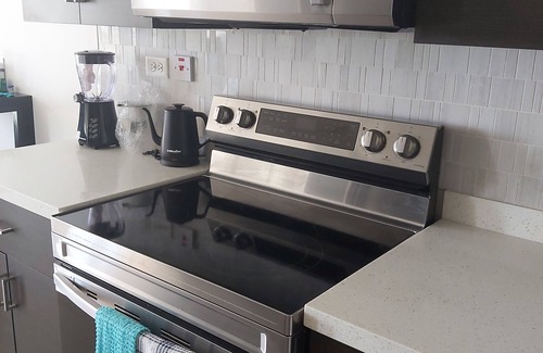 Portmore Condo | Modern yet cozy seaside condo with breathtaking views!