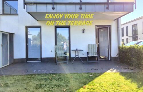 Ibbenbueren Apartment | Modernes Apartment mit Terrasse & Garten, Parkplatz & Self-Check-in