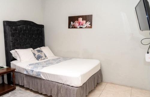 Mona Heights Apartment | Mona Master suite