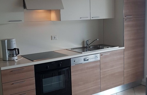 Manerba del Garda Apartment | Montecolo Resort three-room apartment with splendid lake view, swimming pool