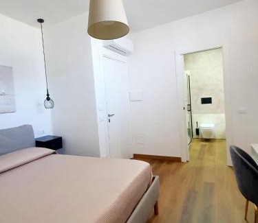 Orosei House | N'Est - Camere di design in centro storico a Orosei