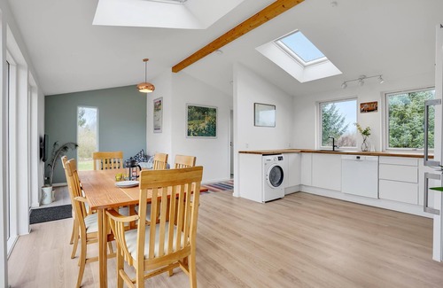 Togeholt House | Near Bønsvig beach, this cozy and modern cottage with a beautiful terrace welcomes you.