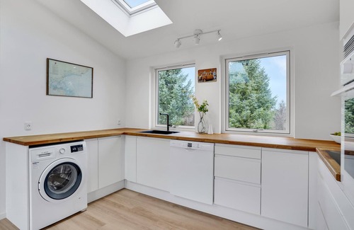 Togeholt House | Near Bønsvig beach, this cozy and modern cottage with a beautiful terrace welcomes you.