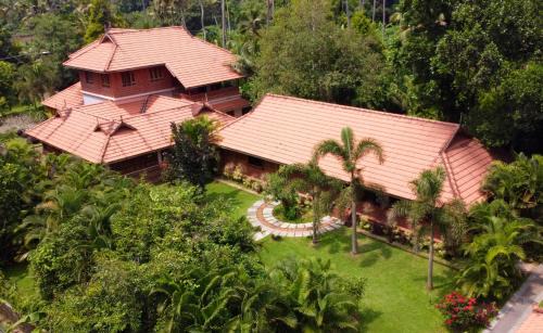 Irinjalakuda Hotel | Neelambari Ecotoursm