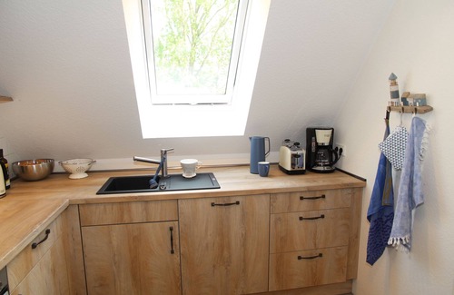 Eilsum Apartment | Neue 80qm Ferienwohnung für 4 Pers. + 2 Hunde mit Kamin, Balkon & Wasserblick