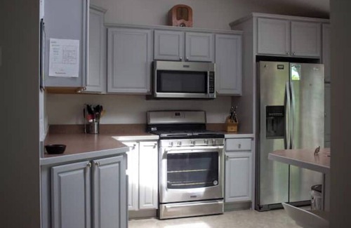 Douglas Condo | New 2 BR condo & private courtyard. CLEAN. Modern Kitchen. Walk/bike to town.