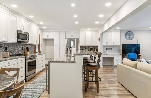 Rapid City House | NEW! Beautiful Torch Lake House with Beach Access