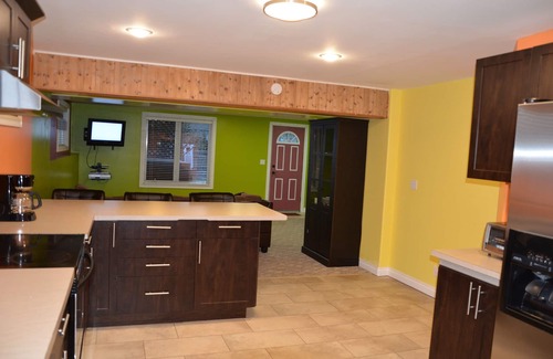 Lacombe Apartment | New! Bright and Spacious Walkout Private Suite