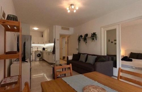 Gibraltar Apartment | NEW Central Escape with Pool Access for Family of 4