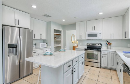 Butler Beach House | New Lighthouse - Spacious Home Near the Beach with Pool & Heated Spa! King Beds!