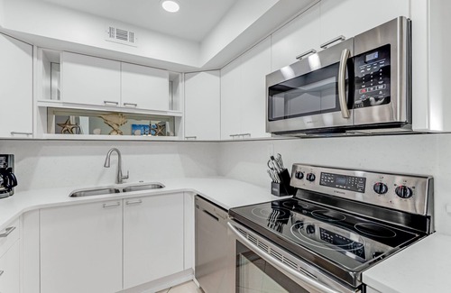 Aquarius Oceanfront Condo | New listing! Direct oceanfront condo with private balcony overlooking the pool and beach