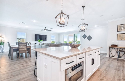 Indian Shores Condo | New Luxury PENTHOUSE Beach Condo with Pool and Water Views!