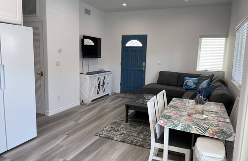 The Strand House | New ocean front duplex, walk to dining, shops & entertainment.