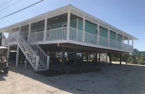 Port Royal House | NEW RENTAL! Conch Heaven is a four bedroom house on a canal with a dock.