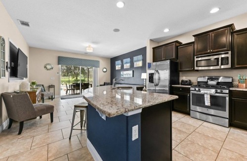 Loughman Villa | NEW! Spacious 5-Bedroom Resort Pool Home with Lake View