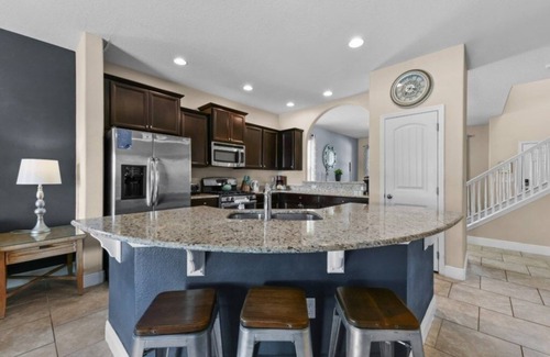 Loughman Villa | NEW! Spacious 5-Bedroom Resort Pool Home with Lake View