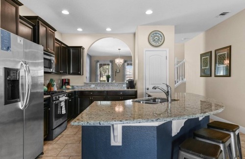 Loughman Villa | NEW! Spacious 5-Bedroom Resort Pool Home with Lake View