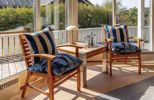 Sklskr House | Nice and bright cottage with a kitchen that is partly open to the dining and living room.