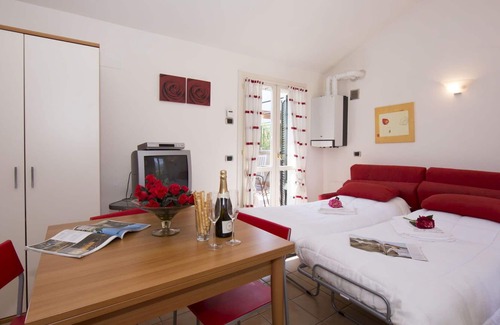 Porlezza Apartment | Nice apartment for 4 guests with WIFI, TV, balcony, pets allowed and parking
