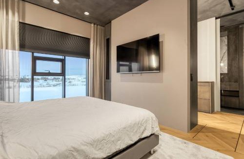 Garðabær House | Nordic Retreat by the Water Hot Tubs Northern Lights