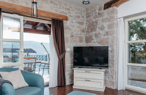 Brkac House | Not far from the picturesque town of Motovun, on the surrounding hills, is this stone vacation home.