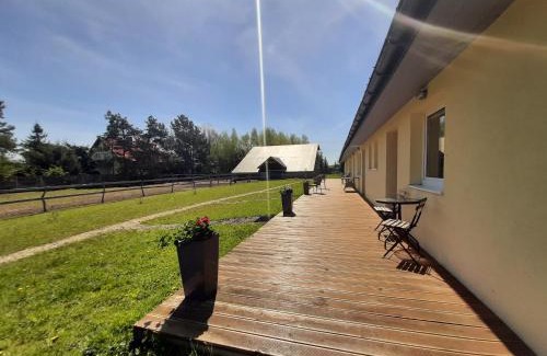 gmina Rusiec Apartment | Nowa Wola 58 - 200qm appartment in a small village, with pool, sauna and big garden