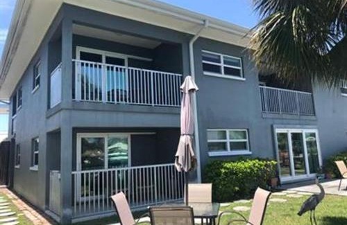 Capri Isle Apartment | Oasis Waterfront Treasure Island Apartment with Patio Dock and Johns Pass