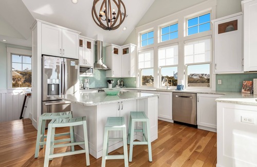 South Beach House | Ocean front 5 bedroom reverse floor plan home! Access to both clubs and 2 new golf carts