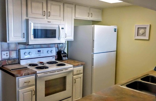 Port Canaveral Condo | OCEAN FRONT Classy, Beachy Double Balcony Condo #306 at Cape Winds Resort