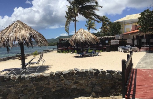 Estate Golden Rock Condo | Ocean front condo complex, 2 bed, 2 bath with a pool. Saltwater lagoon view.