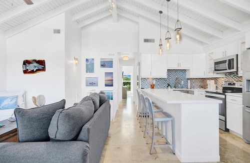 Monroe County House | Ocean Front Villa with endless Views, golf cart, paddle boards, kayak and bikes