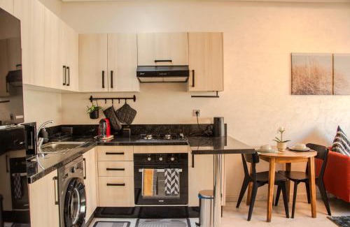 Ain Harrouda Apartment | Ocean Park Sunset Escape beach front with swimming pool