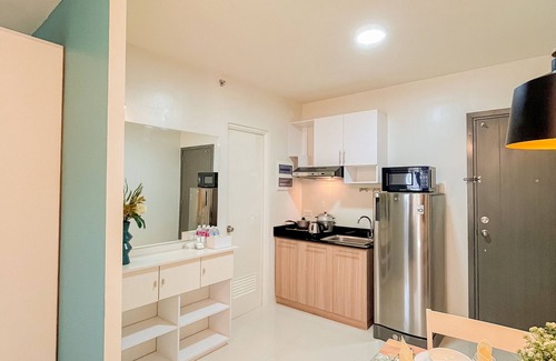 Puerto Princesa City Centre Apartment | Ocean Studio1 Bedroom, Private Balcony, Inviting Pool, and Gym