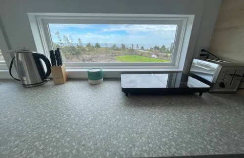 Western Head House | Ocean Top Tiny Home in Western Head, Nova Scotia: Surf, Sunsets and Serenity!