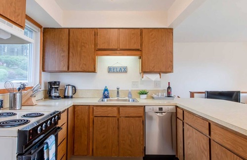 Neahkahnie Beach Condo | Ocean View! Private apartment, allergen free, less than 2 blocks to the beach.