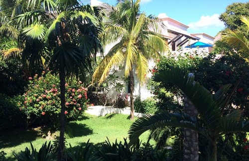 Akumal Condo | Oceanfront double size beach condo in La Sirena condominium