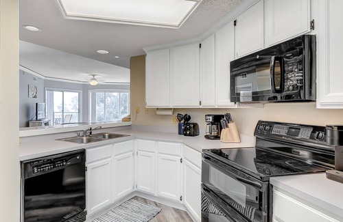 Palmetto Dunes Condo | Oceanfront getaway with lagoon views, shared pool & hot tub – walk to beach