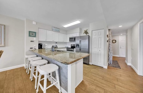 Fort Walton Beach Condo | Oceanfront Poolside Condo-Ground floor-Private Patio-IP107-55 steps to the Beach