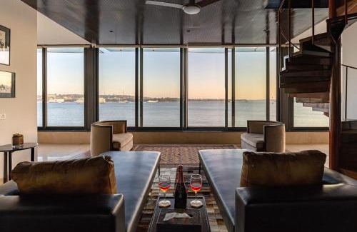 Verem Villa | Oceanic Sunsets with River View, Comp Breakfast & Infinity Pool at StayVista