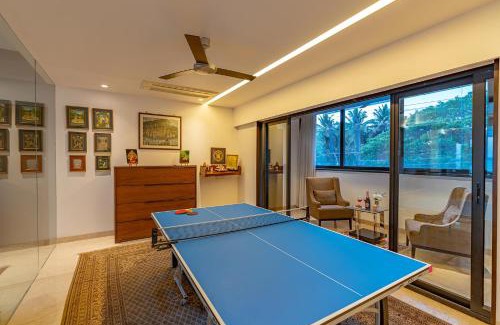 Verem Villa | Oceanic Sunsets with River View, Comp Breakfast & Infinity Pool at StayVista