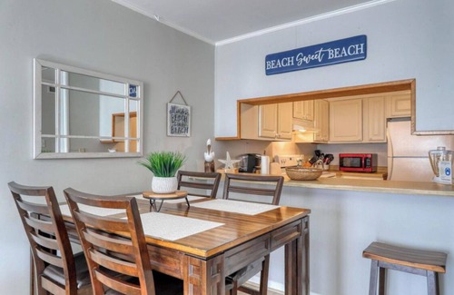 Windy Hill Condo | Oceanview condo overlooking the beach and pool, minutes from everything!